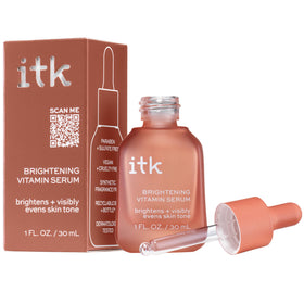 ITK serum applied to cheek demonstrating how it layers under moisturizer smoothly
