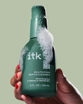 ITK in-hand application on wet face showing smooth spread and removal