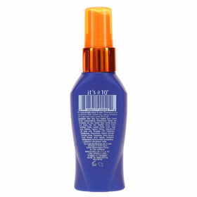 It's a 10 Miracle Leave-In Plus Keratin spray being applied to damp hair for smoother styling