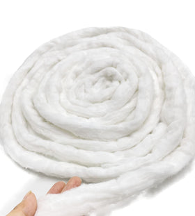 Ivie cotton coil front view showing pure white roll and compact packaging benefit