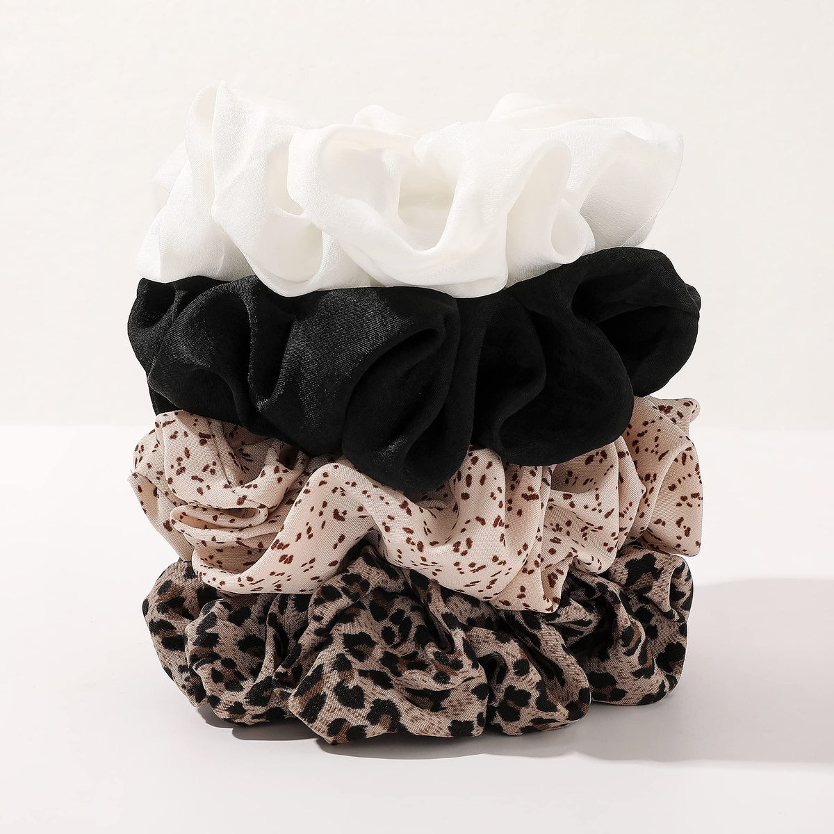 ivyu scrunchie in a bun in a lifestyle setting offering polished look