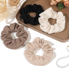 Ivyu scrunchie in a high ponytail giving secure hold without slip