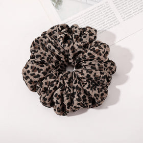 ivyu purple scrunchie on white background emphasizing vibrant color
