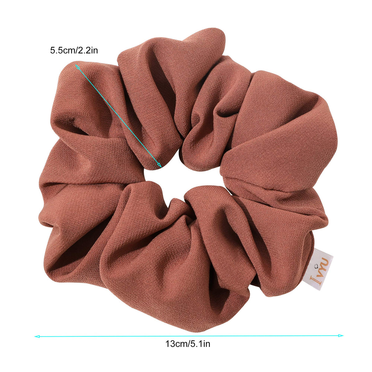 Ivyu scrunchie on curly ponytail displaying strong hold and reduced creasing