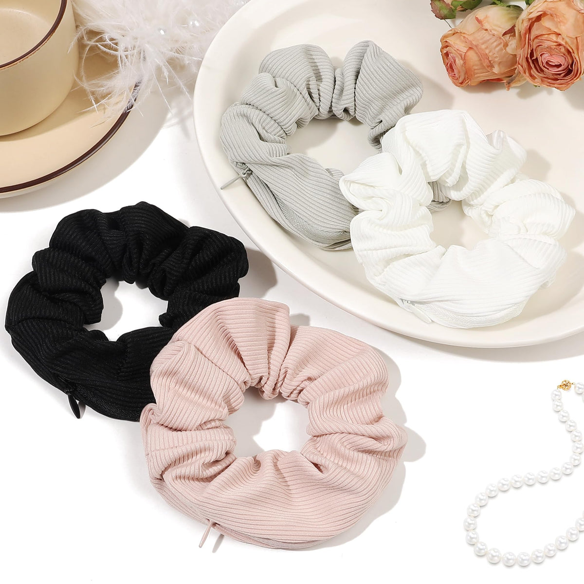 Ivyu scrunchie beside coin showing pocket size and travel-ready convenience