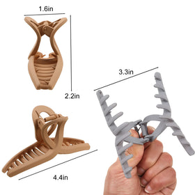 Ivyu size comparison next to hand showing large jaw for thick hair