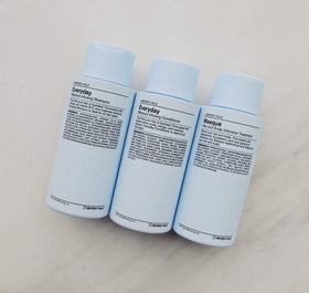 J Beverly Hills eucalyptus, castor, jojoba bottles showcasing botanical support benefit