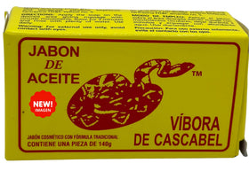 JABON DE ACEITE VIBORA DE CASCABEL beside ruler showing 140g scale and portability