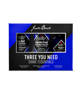 Jack Black applying scrub to damp face to exfoliate and reduce ingrown hairs