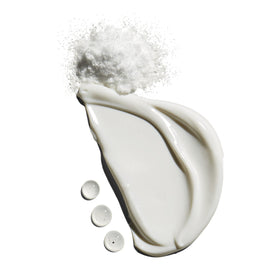 Jack Black moisturizer applied on hand demonstrating easy spreadability and absorbency