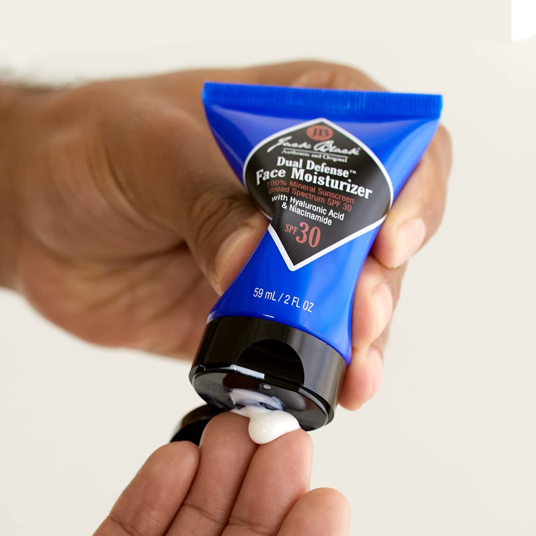 Jack Black tube beside daily routine items showing compact travel-friendly size