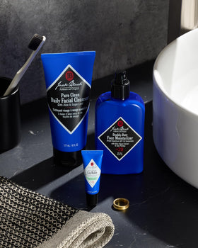 Jack Black lip balm in outdoor setting showing weather protection and durability