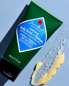 Jack Black shampoo being poured into hand showing easy application and control