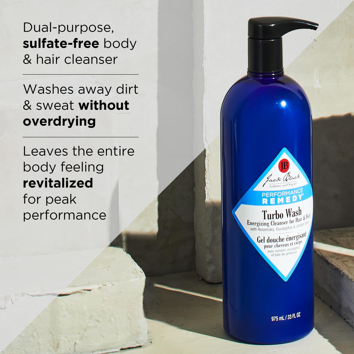 jack black scale next to hand to show true 10 fl oz size and portability