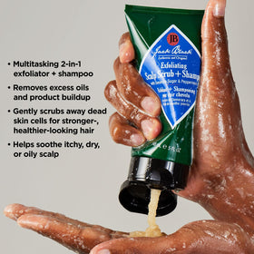 Jack Black product on fingertips massaging scalp demonstrating soothing benefit
