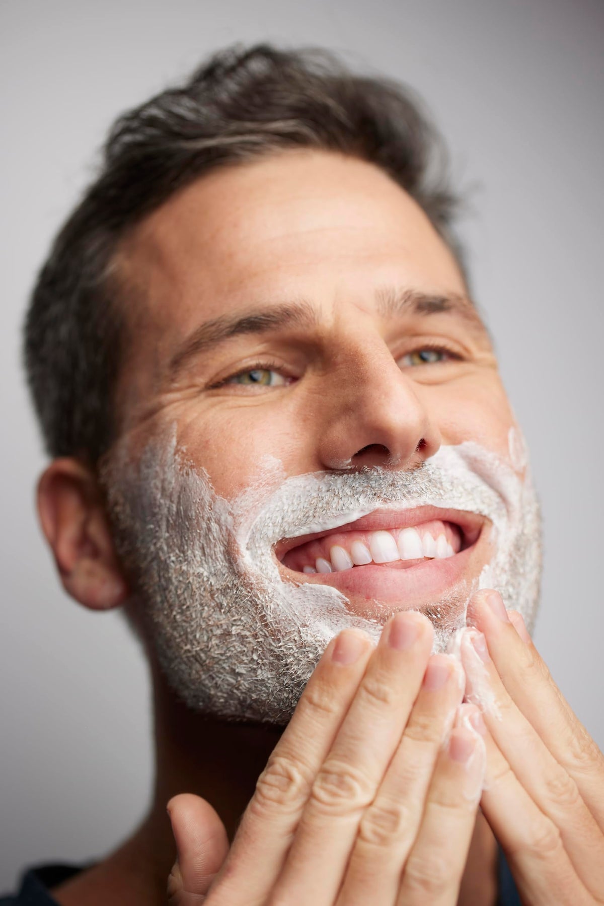 Jack Black three-piece kit flatlay in bathroom showing streamlined grooming routine