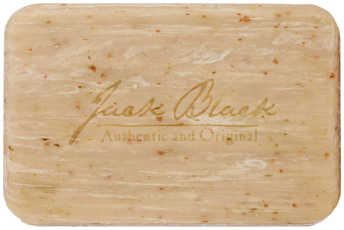 jack black close-up of lava rock exfoliant texture, displays abrasive beads for polishing