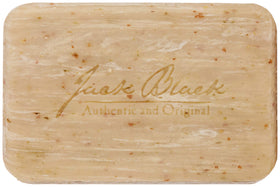 jack black close-up of lava rock exfoliant texture, displays abrasive beads for polishing