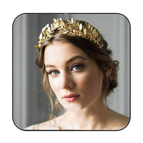 JAKAWIN gold leaf crown front view showing elegant halo effect