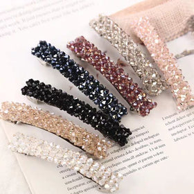 Jakeni close-up of rhinestone detail highlighting precise cuts and reflective sparkle