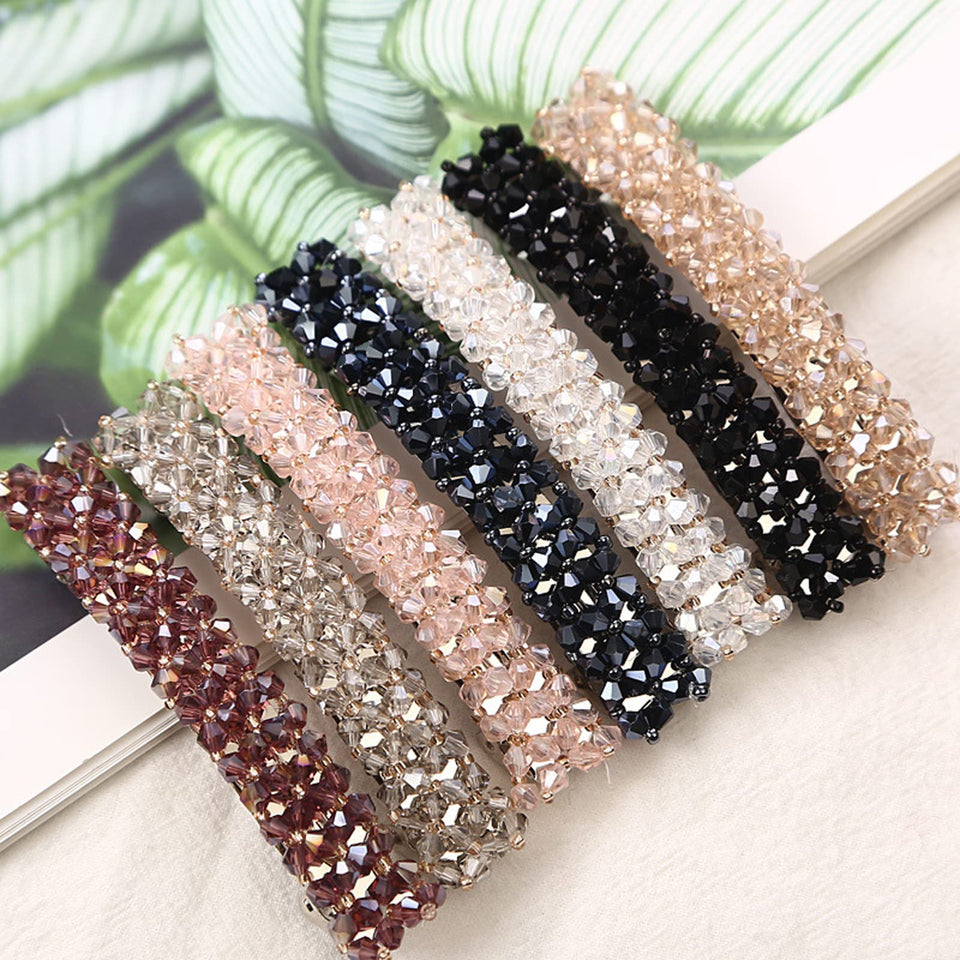 Jakeni front packaging view showing sparkling flower barrette and elegant presentation