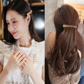 Jakeni barrette next to ruler showing 3.5-inch scale for sizing clarity