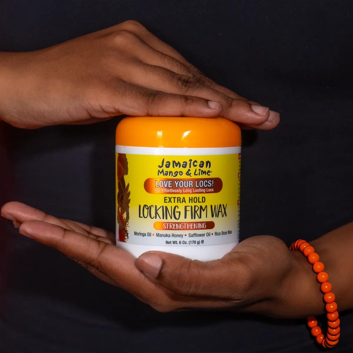 Jamaican Mango & Lime in a styling kit on a vanity conveying polished protective styles