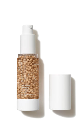jane iredale bottle front view showing sleek design and lightweight glow