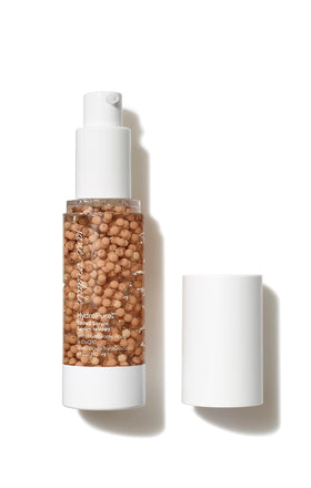 jane iredale front packaging showing tinted serum and benefits