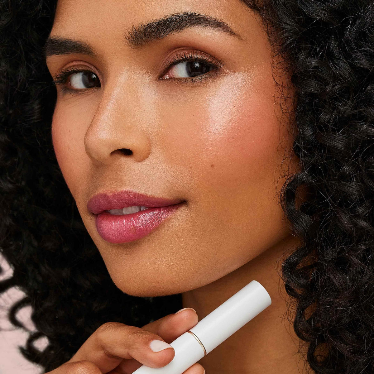 jane iredale swatch on arm showing pH-activated color development
