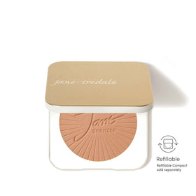 jane iredale model applying bronzer to cheek for natural warmth