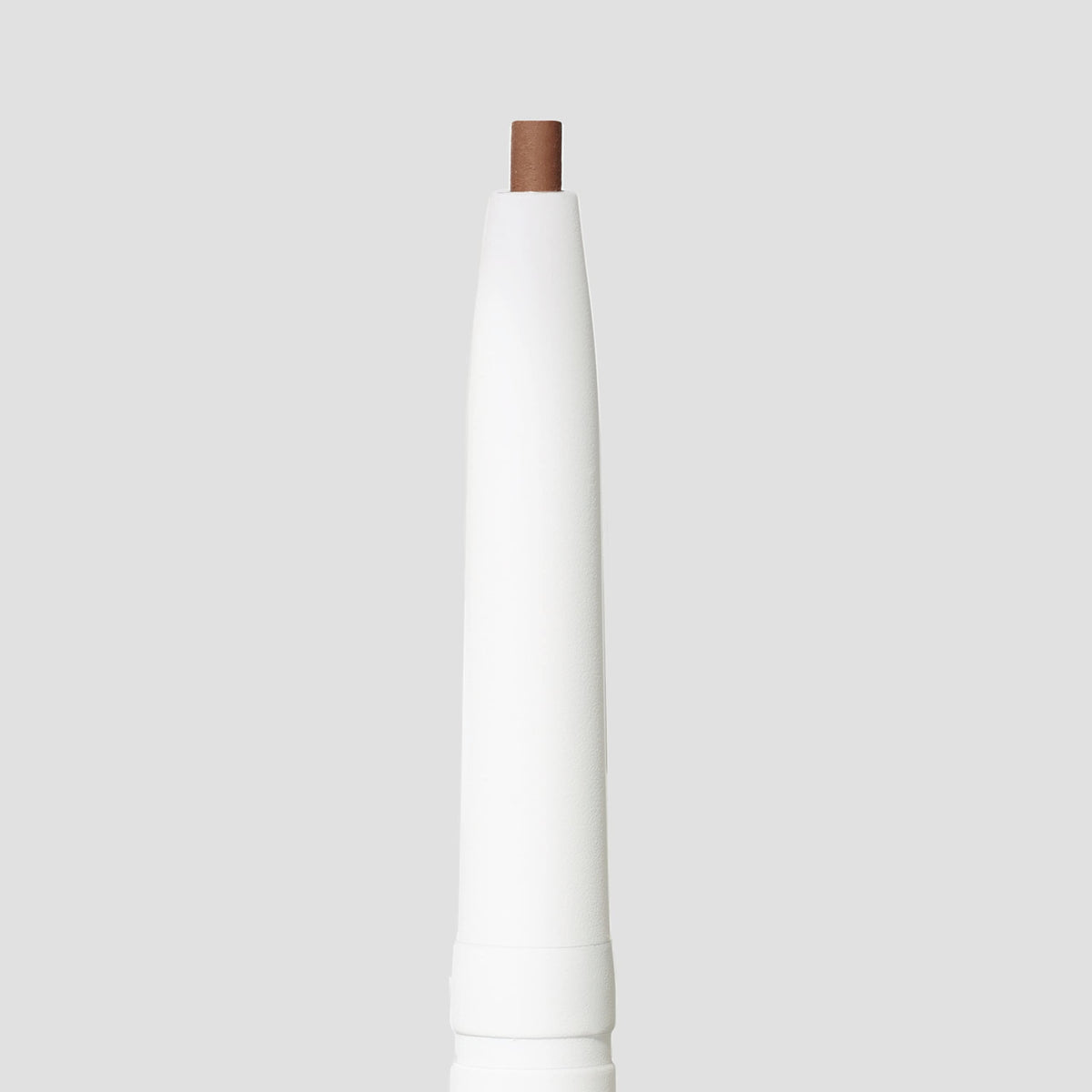 jane iredale pencil in hand illustrating compact travel-friendly scale and ease