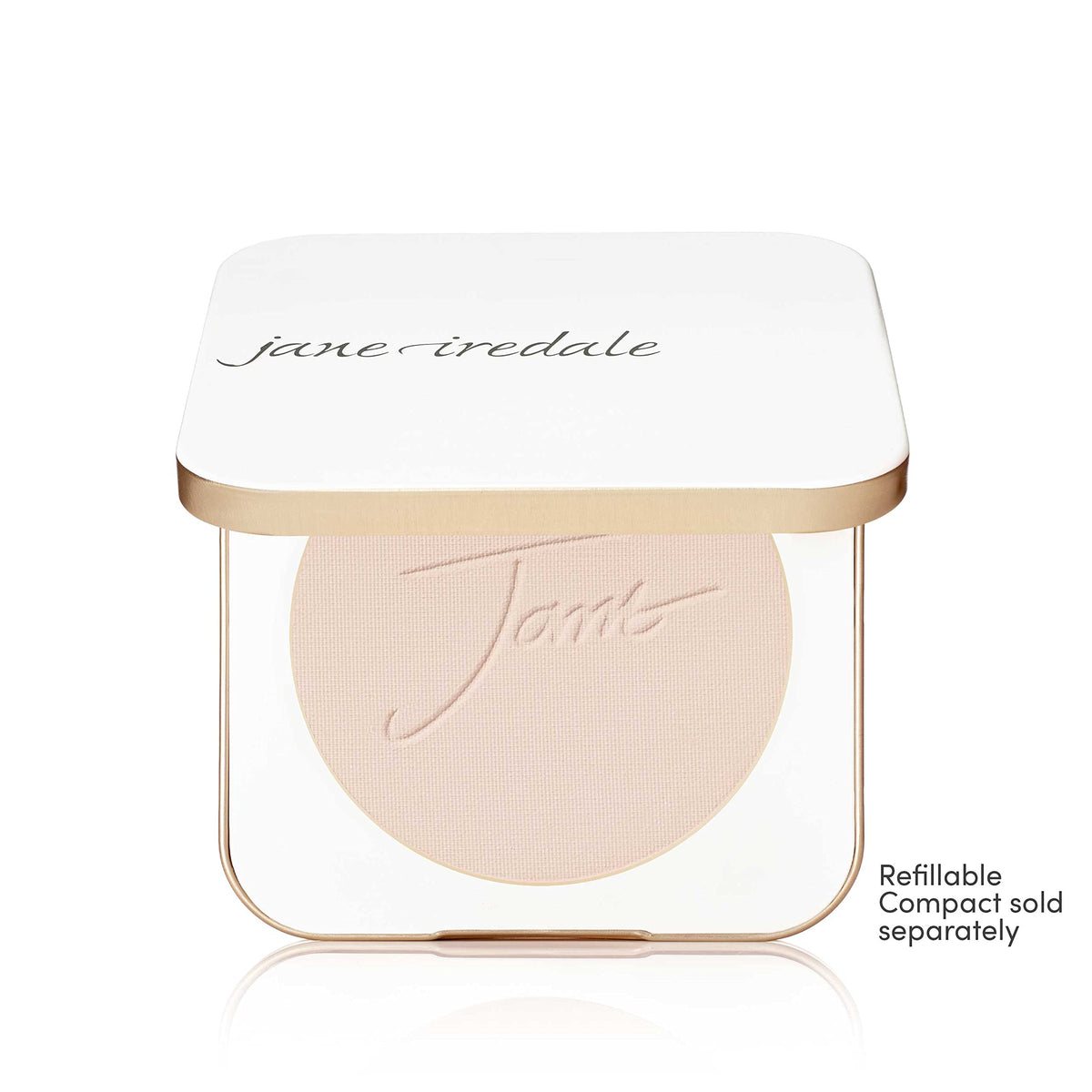 jane iredale brush applying ivory powder illustrating buildable coverage control