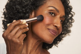 jane iredale blush applied with brush for buildable color