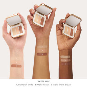jane iredale compact held in hand to show scale and travel-ready convenience