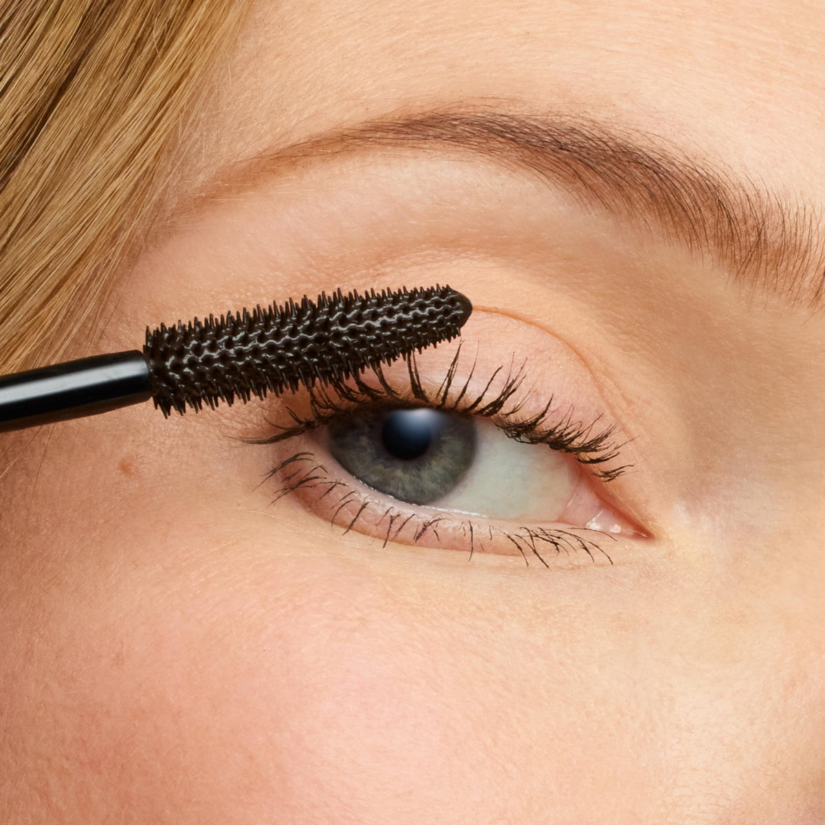 jane iredale polymer tubing texture close-up demonstrating lightweight finish