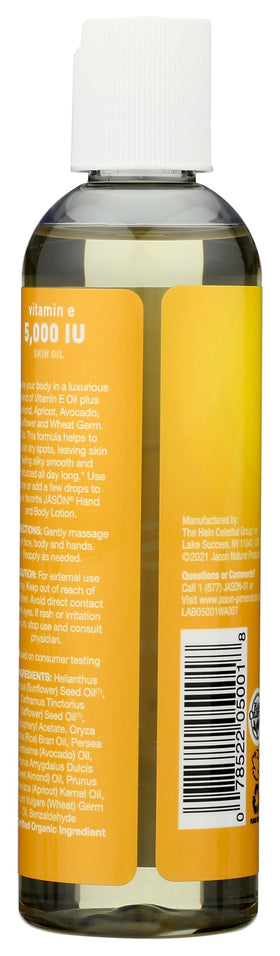 JASON vitamin E oil dispensing a drop from the bottle for measured application and convenience