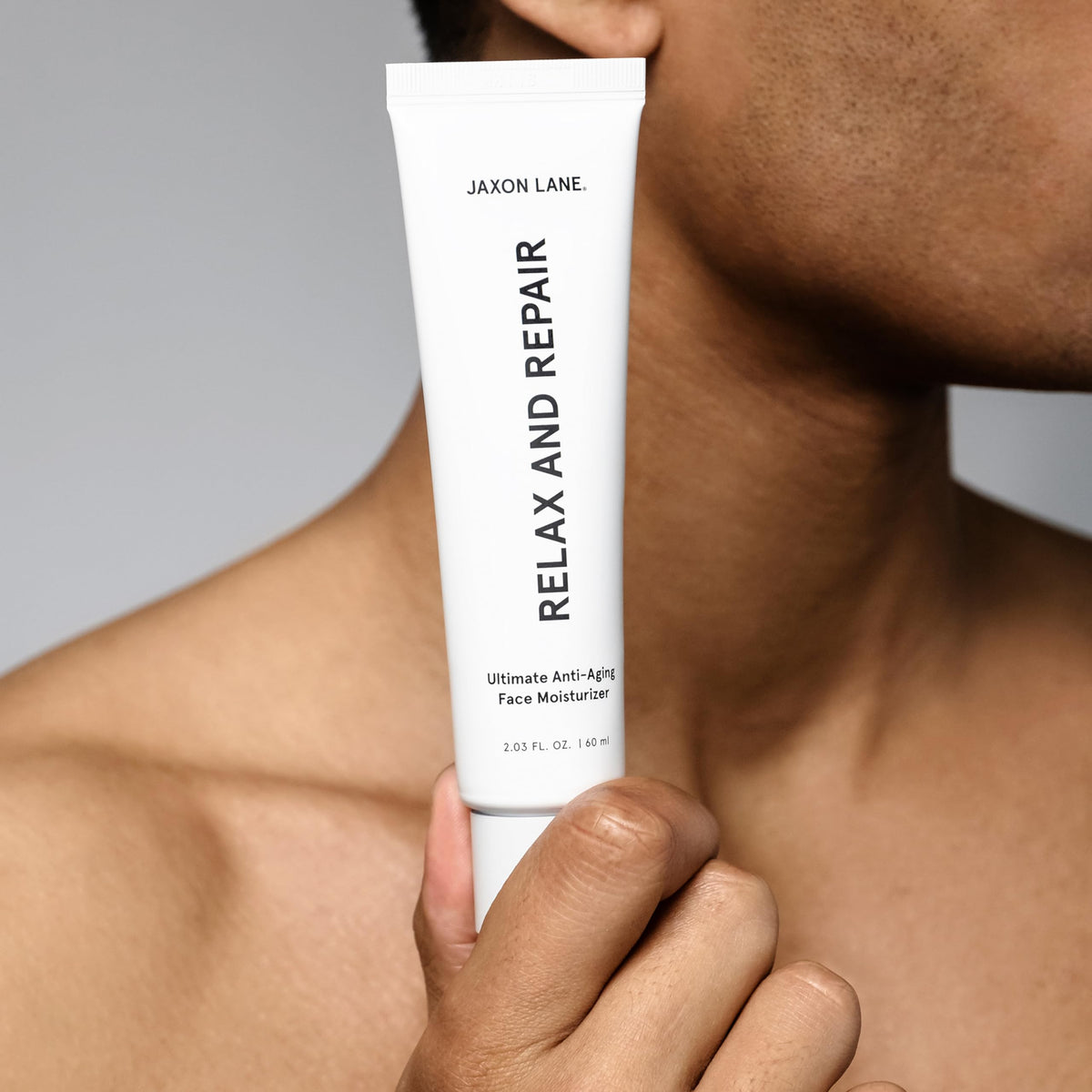 JAXON LANE pump dispensing moisturizer for easy, controlled application