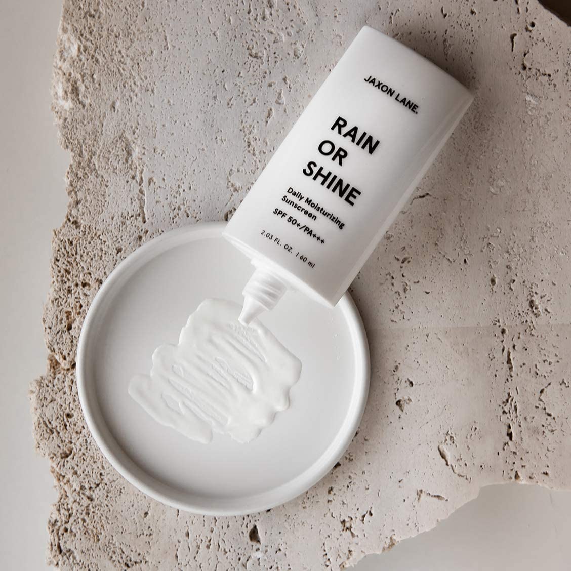JAXON LANE beneath foundation showing compatibility with makeup benefit
