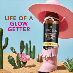 Lifestyle shot of Jergens in a beach bag implying vacation-ready, sunless glow