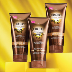 Jergens bottle in beach bag suggesting travel-ready, fresh-scented tan