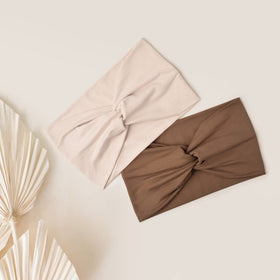 Jesries headbands laid out in travel scene showing packable convenience