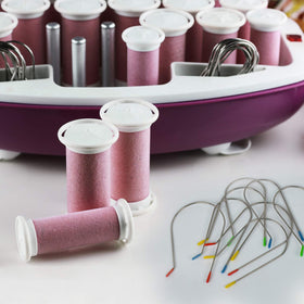 Jicoyin clips beside a ruler showing 2-inch roller fit for easy size confirmation