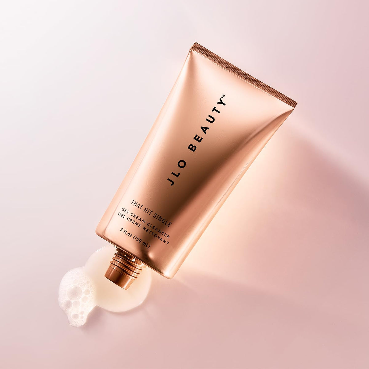 JLO BEAUTY 5 oz size scale with hand for accurate product size