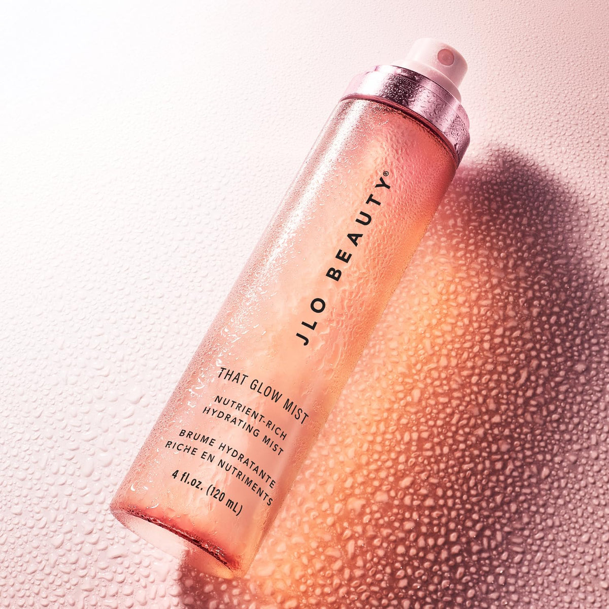 JLO BEAUTY ingredient flatlay with ceramides and hyaluronic acid benefits
