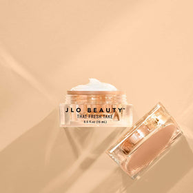 JLO BEAUTY comparison visual suggesting brighter-looking under eyes after use