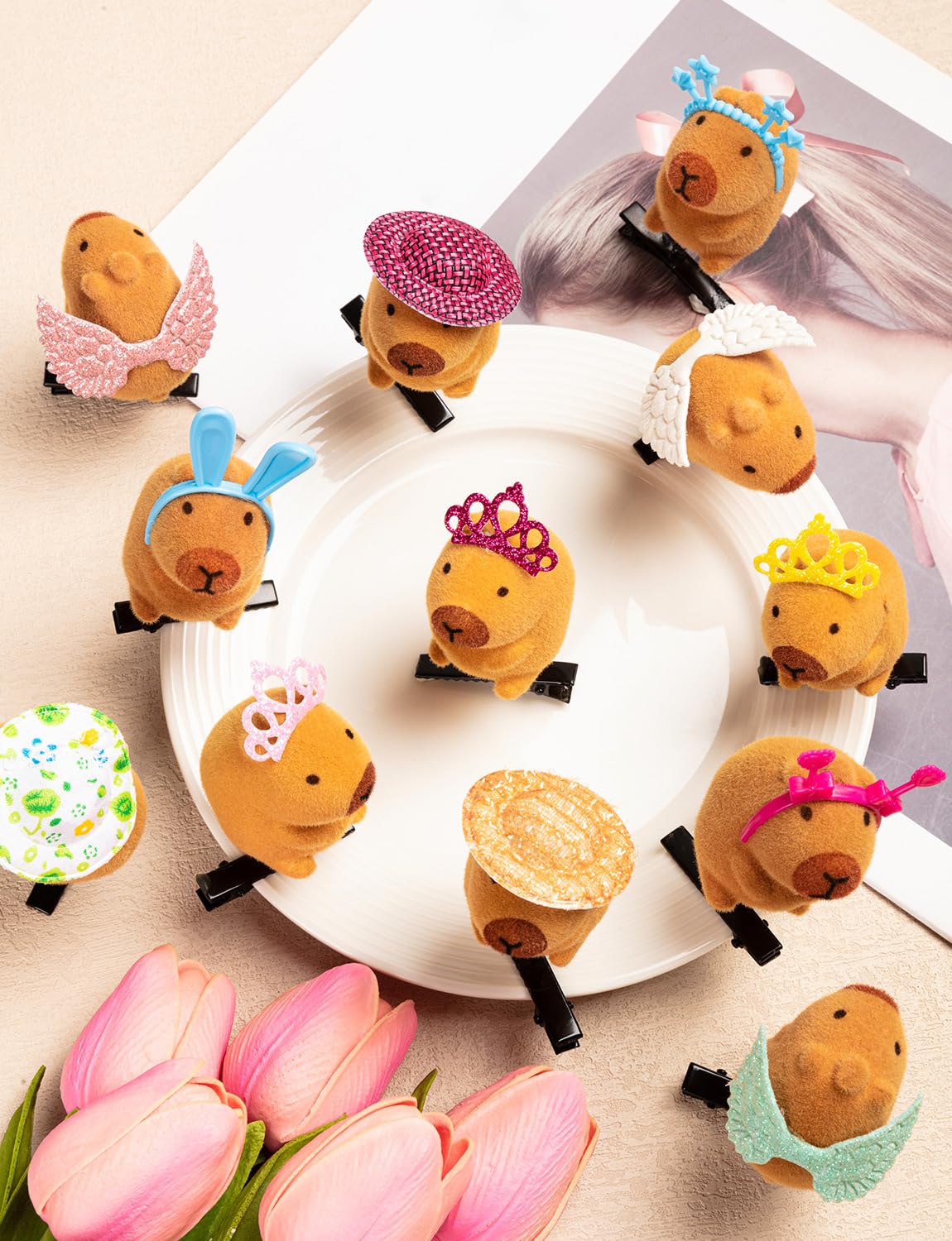 JMZYJZH detailed shot of capybara headpieces showing bows and tiny hats