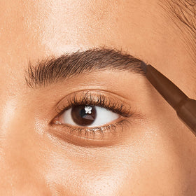JOAH model applying brow product showing natural definition and ease