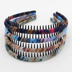 JOBAND front view of four-color headbands showing compact pack and variety