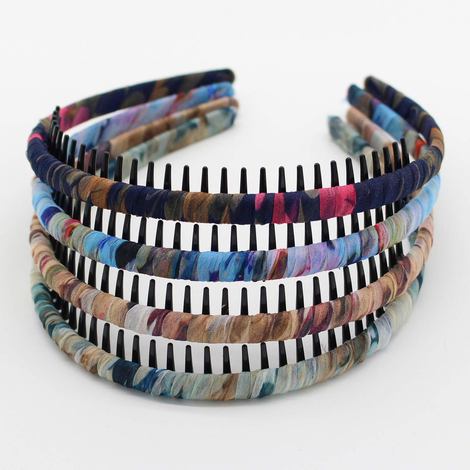 JOBAND front view of four-color headbands showing compact pack and variety